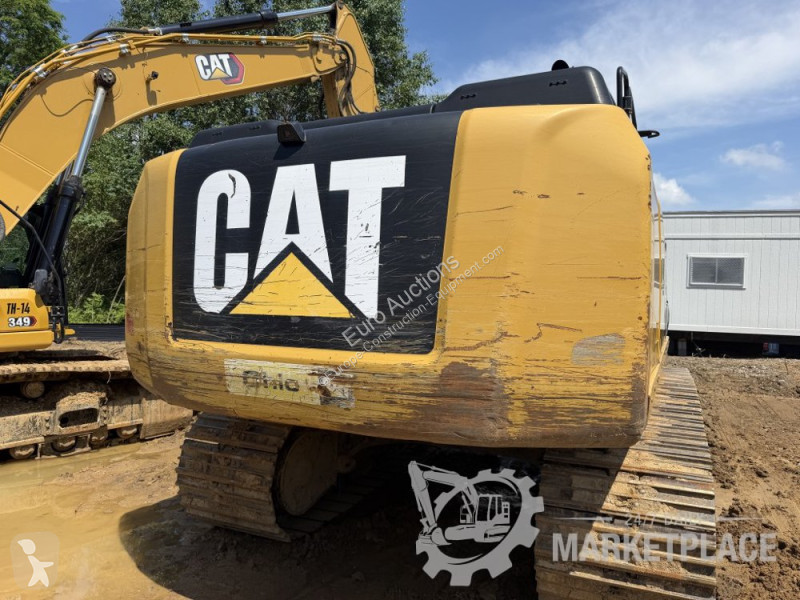 Екскаватор Caterpillar
