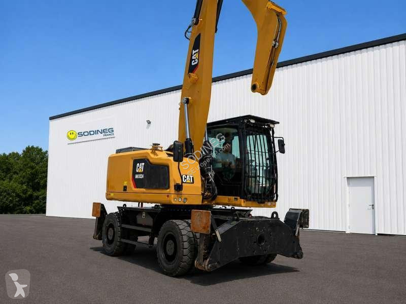 Экскаватор Caterpillar MH4