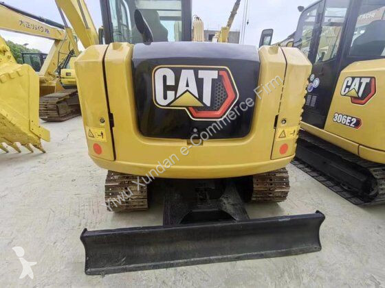 Экскаватор Caterpillar 305