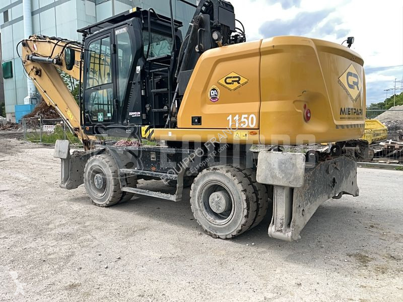 Lopatový nakládač Caterpillar MH3026