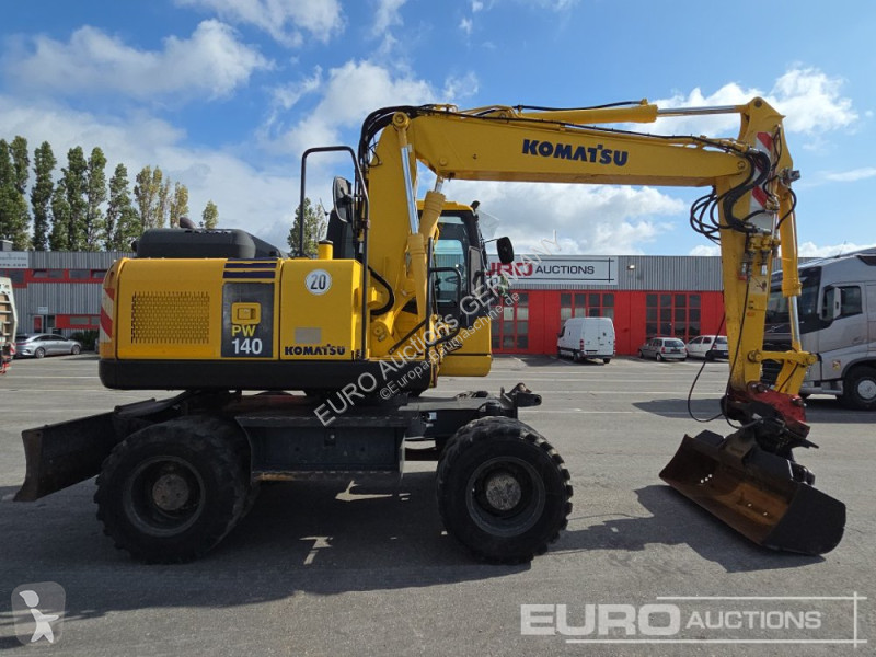 Багер Komatsu