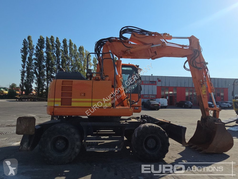 جرافة Komatsu PW148-8