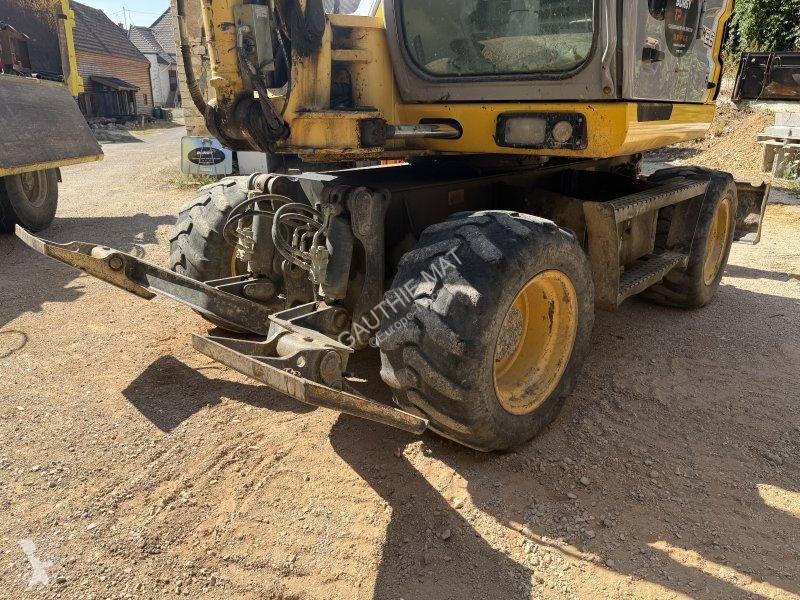 Lopatový nakládač New Holland 26