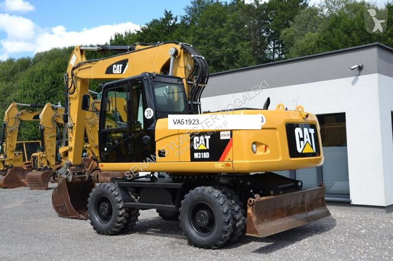 Lopatový nakládač Caterpillar 318 D