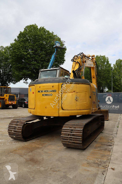 Багер New Holland Kobelco 2