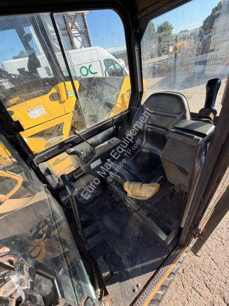 Екскаватор Caterpillar