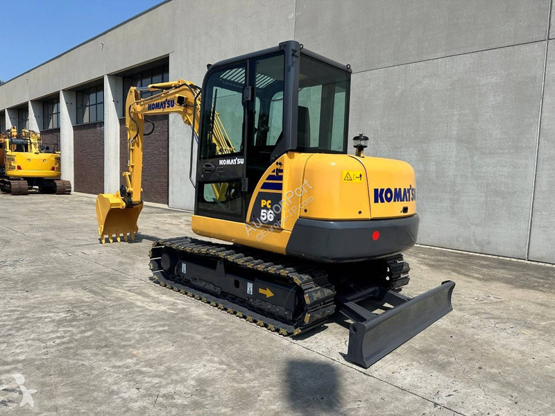 Екскаватор Komatsu 7