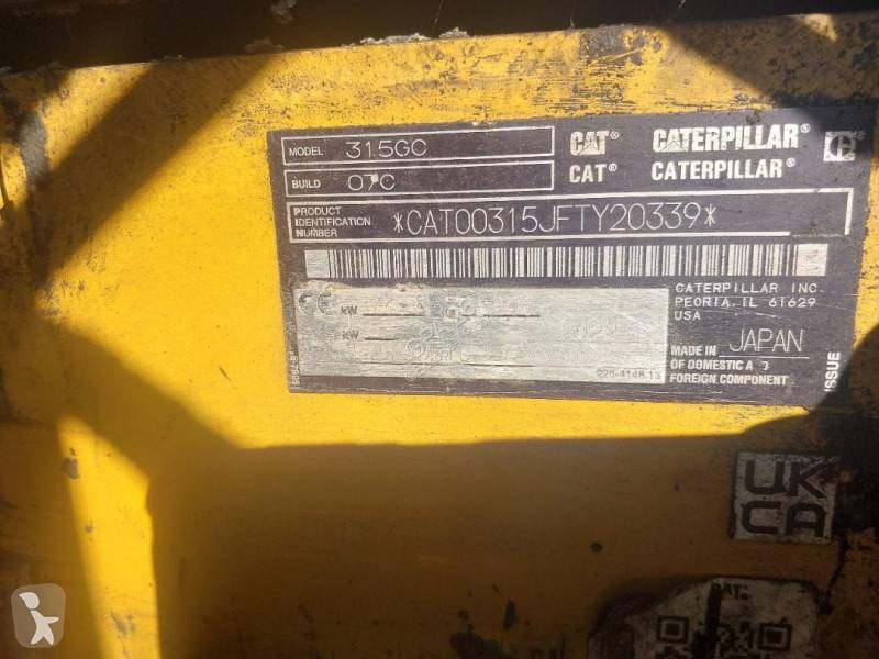 Екскаватор Caterpillar