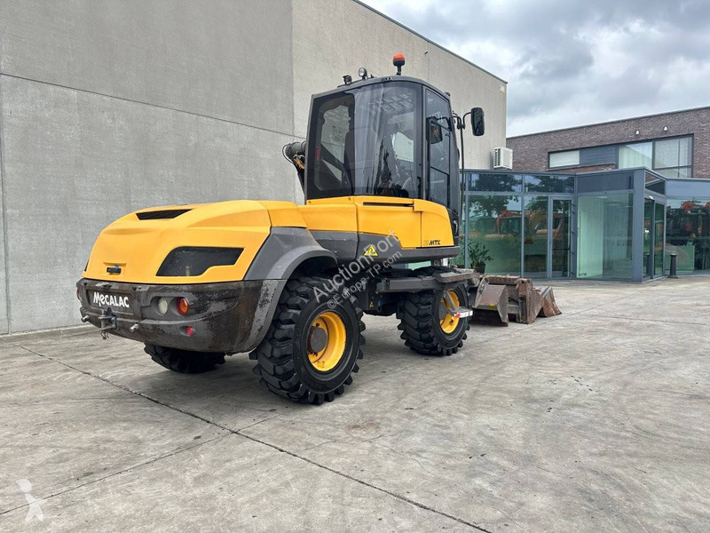 Экскаватор Mecalac