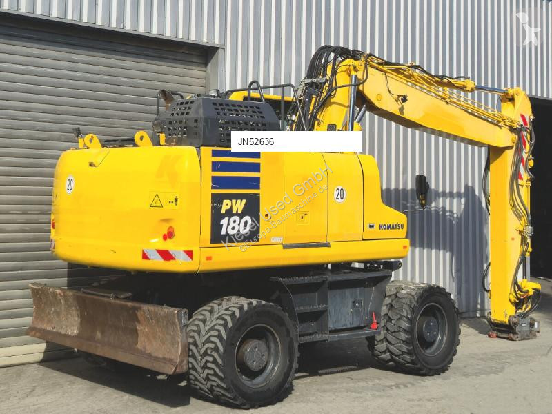 Rýpadlo Komatsu 11