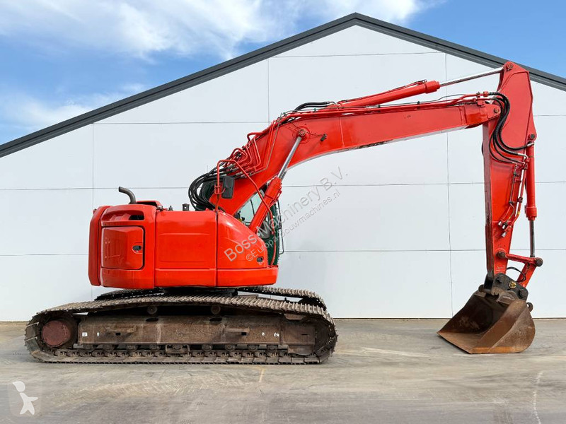 Pelle New Holland Kobelco E235B SR2 - 360°...