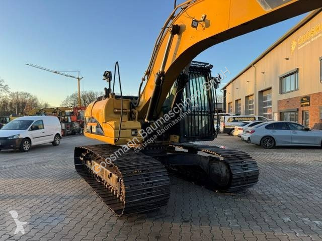 Багер Caterpillar L