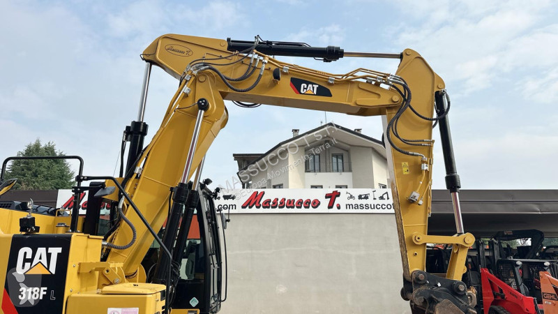 Багер Caterpillar 318FL