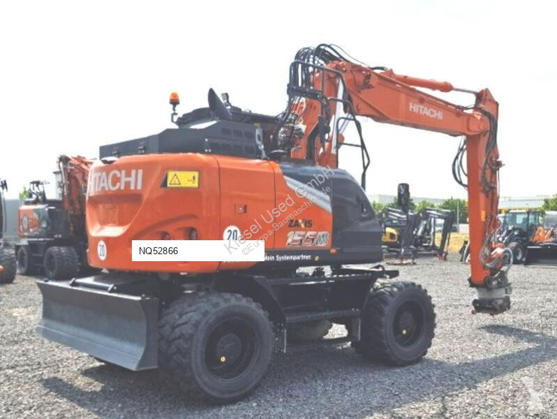 Багер Hitachi MTC Pro
