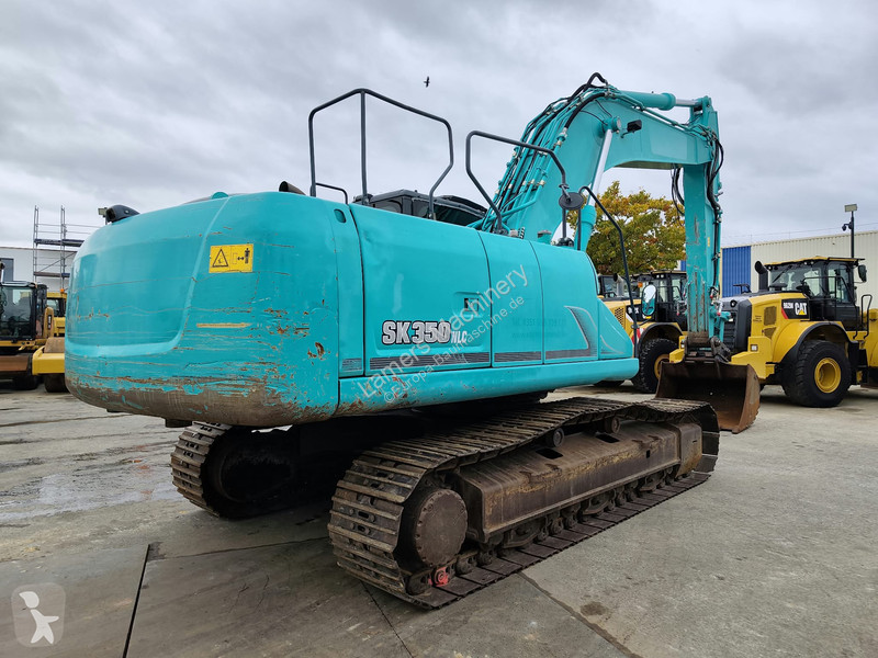 جرافة Kobelco SK350 NLC-9 .
