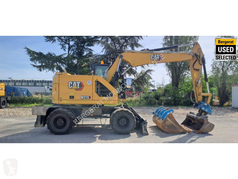Багер Caterpillar