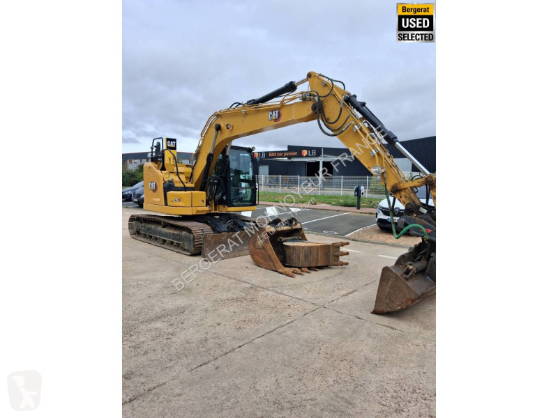 Багер Caterpillar GC