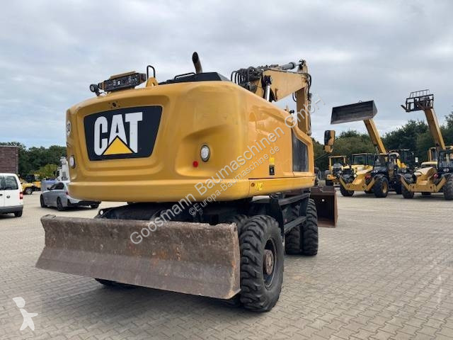 Багер Caterpillar F