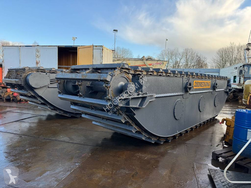 Lopatový nakládač Caterpillar swamp buggy...