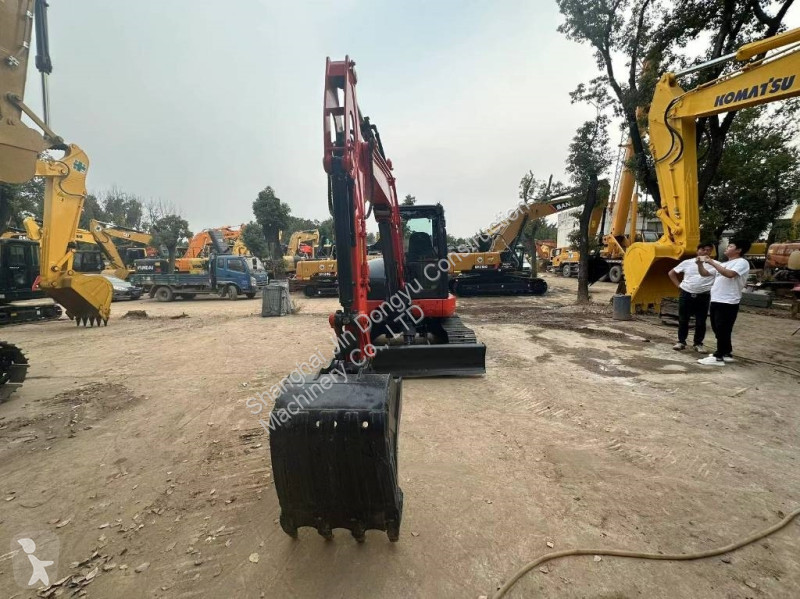 Escavadora Kubota KX163