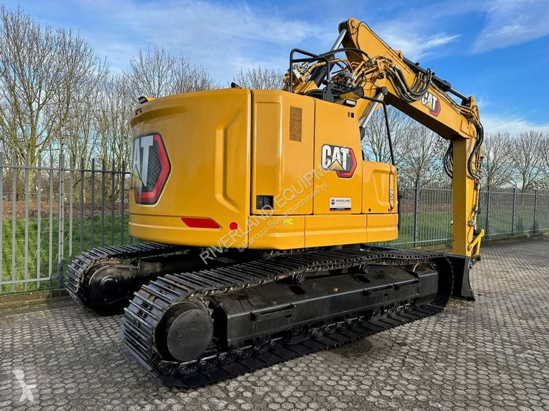 Graafmachine Caterpillar 325 with dozerblade...