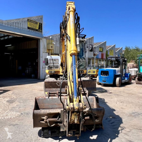 Excavator New Holland PELLE A PNEUS 10T 26