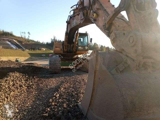 Escavadora Case