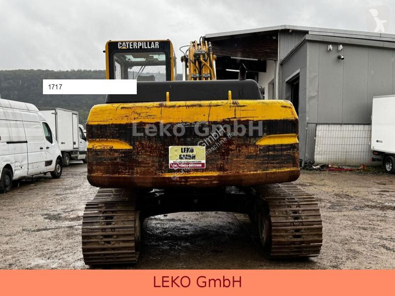 Escavatore Caterpillar 318B Mit Zwei Löffeln