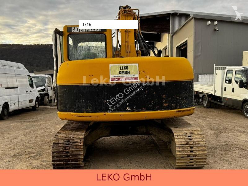 Lopatový nakládač Caterpillar 311C Mit Zwei...