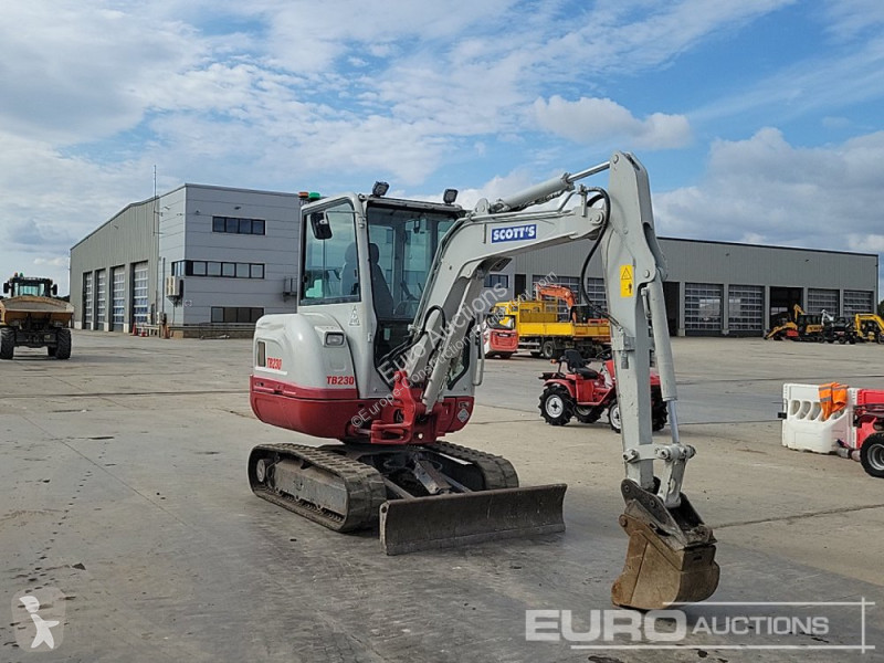 Escavadora Takeuchi 0