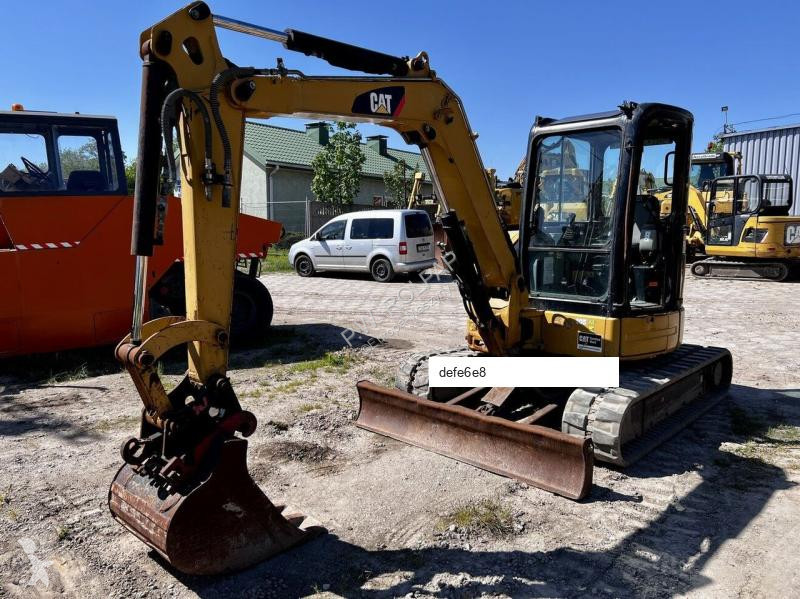 Lopatový nakládač Caterpillar CAT 304C