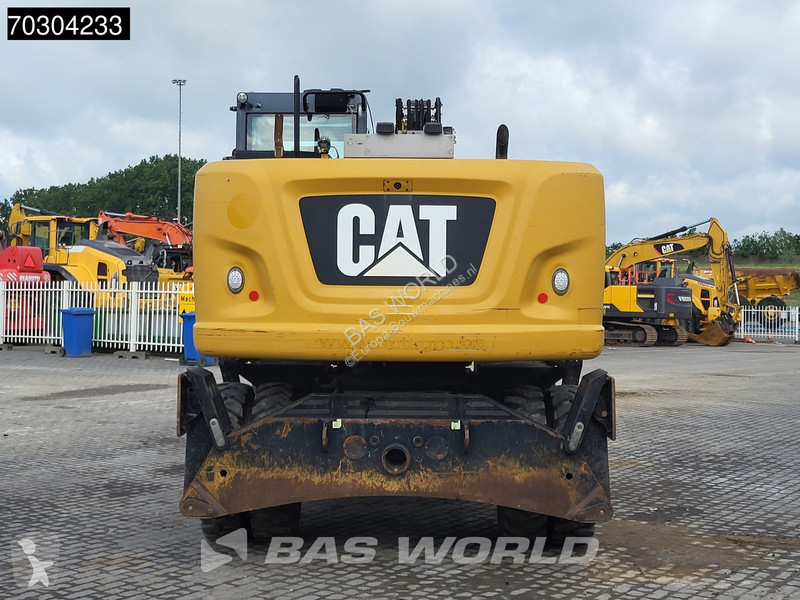 جرافة Caterpillar F F Outrigger + Blade