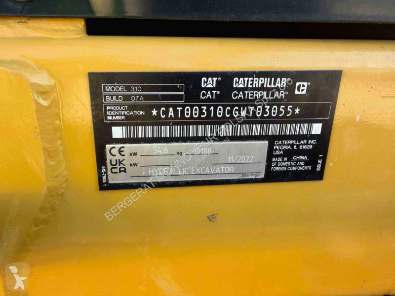 Экскаватор Caterpillar 310