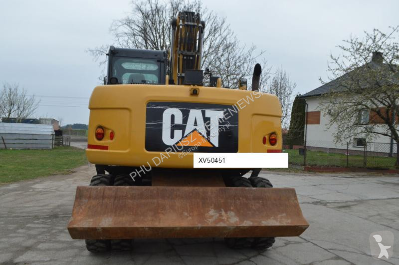 Lopatový nakládač Caterpillar 313