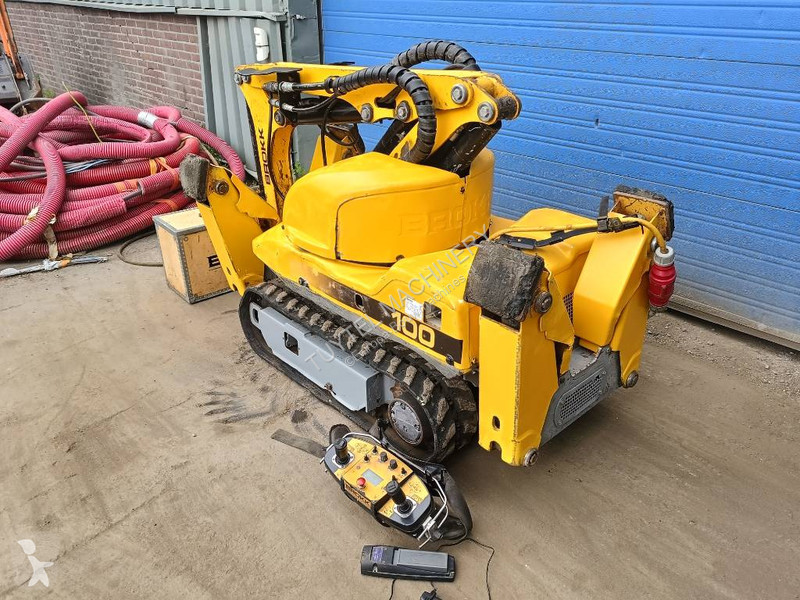 Lopatový nakládač Brokk 100 husqvarna robot...