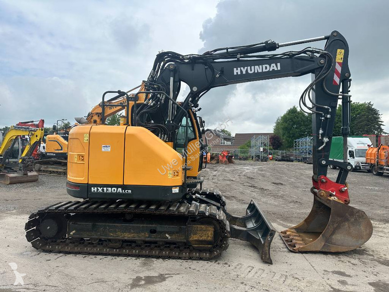 جرافة Hyundai HX 130 ALCR Kettenbagger 76.000...