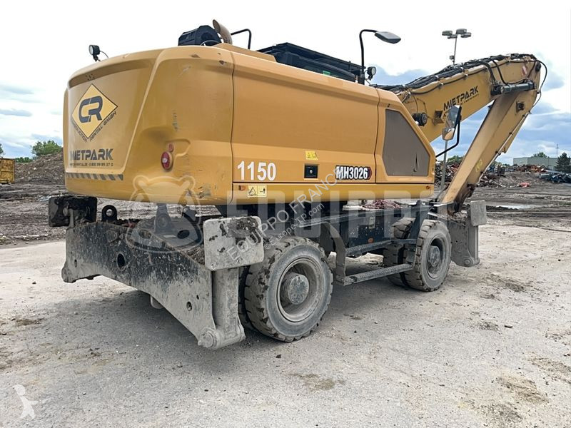 Lopatový nakládač Caterpillar MH3026