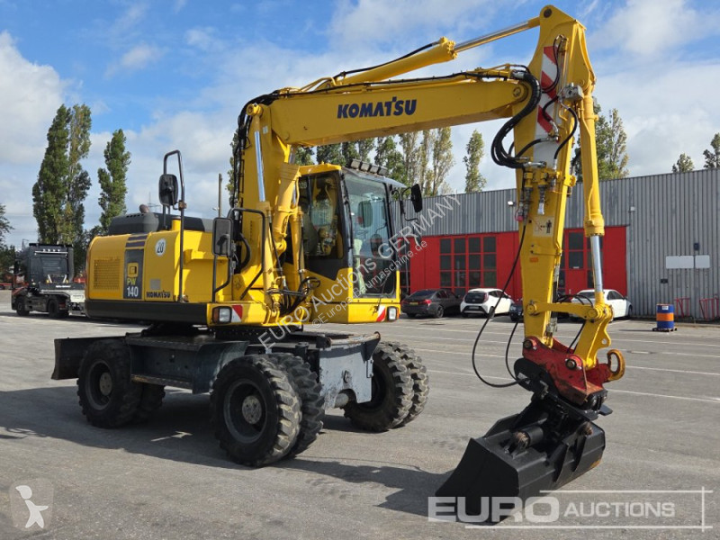 Багер Komatsu