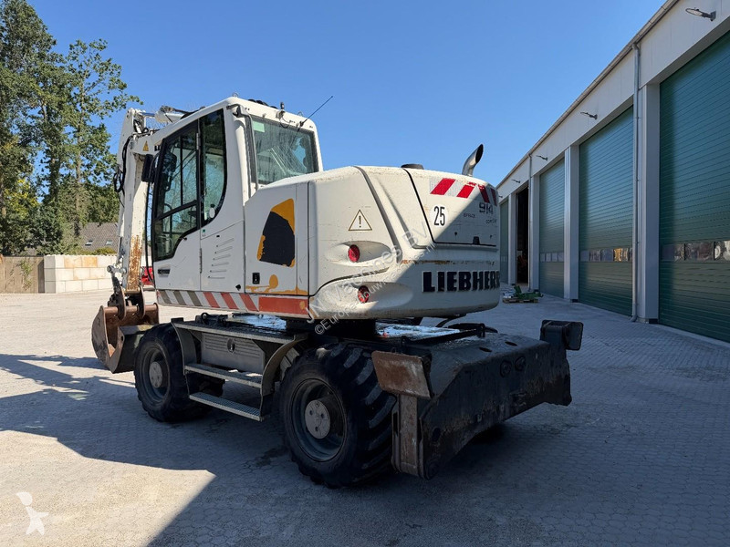 Lopatový nakládač Liebherr A Compact Outriggers...
