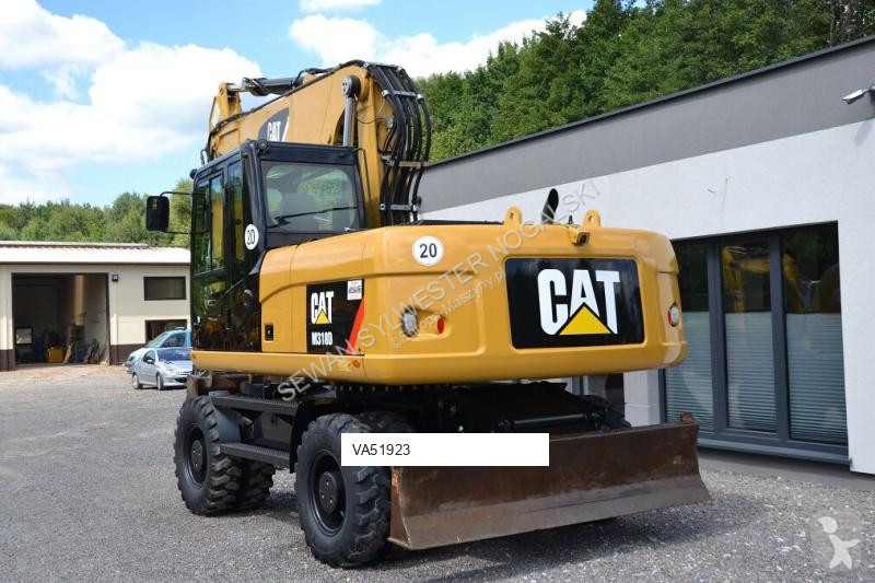 Lopatový nakládač Caterpillar 318 D