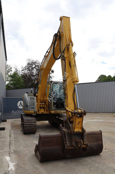 Багер New Holland Kobelco 2
