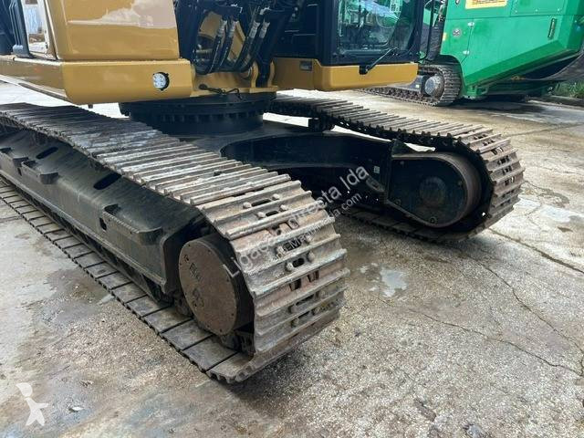 Багер Caterpillar 323