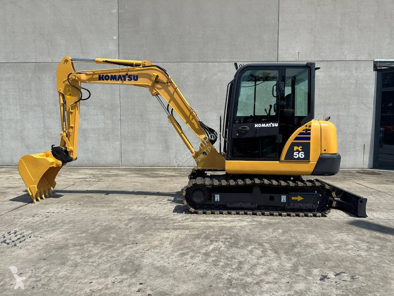 Екскаватор Komatsu 7