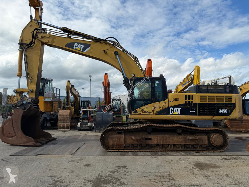 Екскаватор Caterpillar