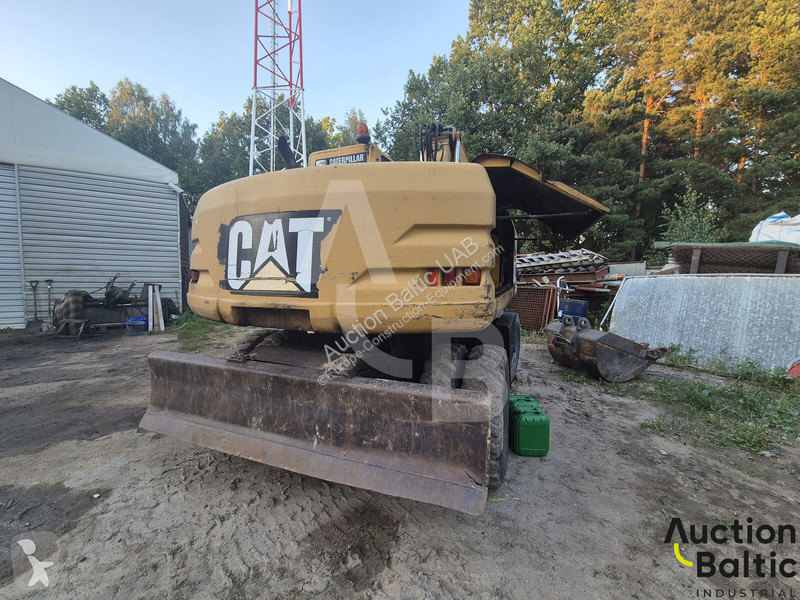 Екскаватор Caterpillar