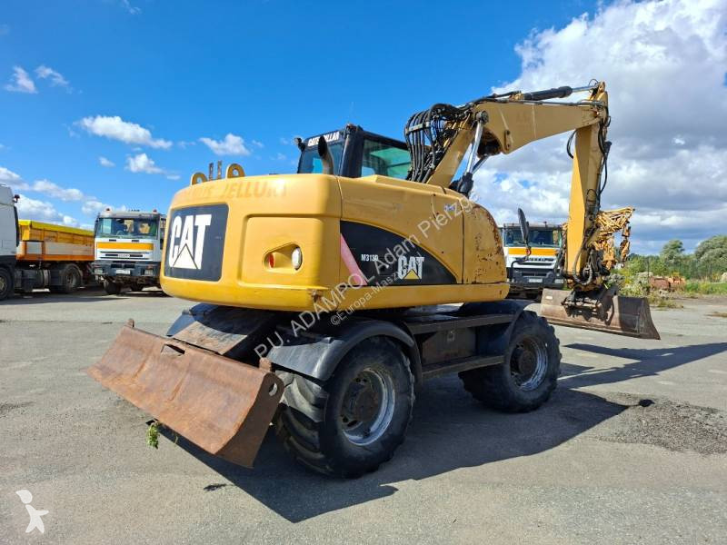 جرافة Caterpillar M 313 D 315