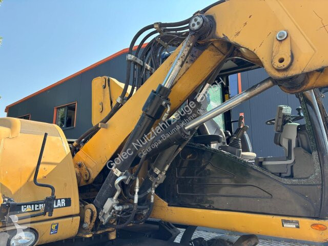 جرافة Caterpillar M313D Mobilbagger Hochfahr....