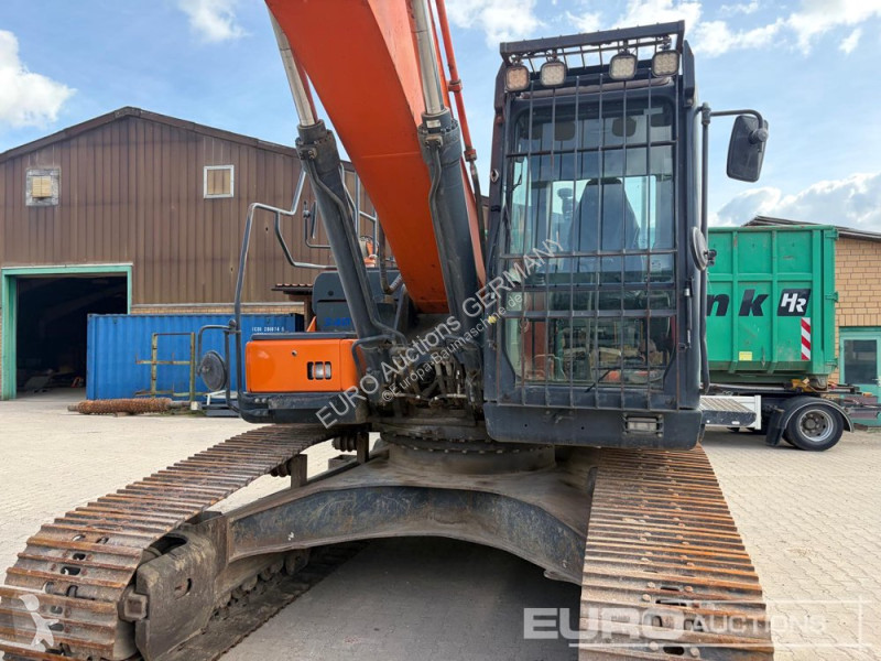 Багер Doosan 5