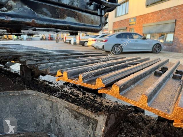 Багер Caterpillar L