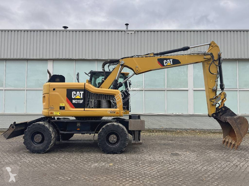Багер Caterpillar F 2017